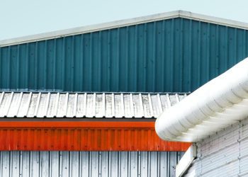 Building Envelope Harmony: The Case for Unified Cladding and Roofing Contractors