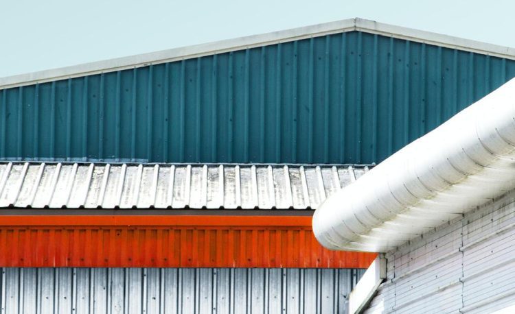 Building Envelope Harmony: The Case for Unified Cladding and Roofing Contractors